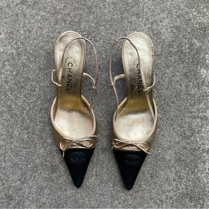 CHANEL ‘CC’ Gold Leather Black Satin Cap Toe Slingback Heels